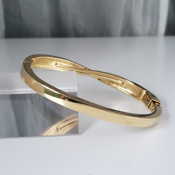 Swarovski Edith Goldtone Twist Rows Pave Hinged Bracelet - Picture 3 of 13